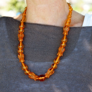 Applejuice Bakelite Carved Bead Necklace Translucent