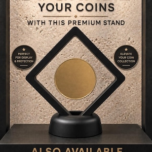 May include: A black diamond-shaped floating display frame with a circular gold coin suspended in the center, mounted on a round black base. The text reads: UPGRADE YOUR COINS WITH THIS PREMIUM STAND, PERFECT FOR DISPLAY & PROTECTION, ELEVATE YOUR COIN COLLECTION, ALSO AVAILABLE IN MY SHOP.
