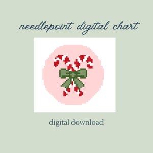 May include: Digital needlepoint chart featuring a pixelated design of two candy canes with red and white stripes, tied with a green bow, set against a pink background. The words "needlepoint digital chart" and "digital download" are also in the image.