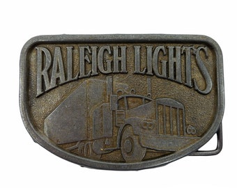 Vintage Raleigh Lights Cinturón Hebilla Camionero de metal Semi camión 18 ruedas