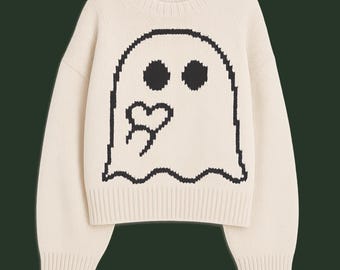 May include: A cream-colored long-sleeve knit sweater featuring a large, black, pixelated ghost graphic on the front. The ghost design includes two circular eyes and a small heart shape on its lower side, all rendered in a jagged, glitch-like style.