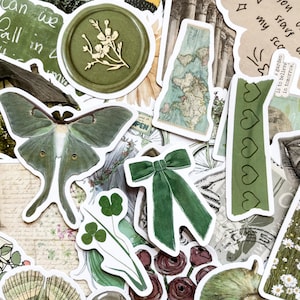 May include: A collection of decorative stickers in shades of green, beige, and brown. The stickers feature a moth, a bow, a map, a wax seal with a floral design, and text that reads "can we fall in" and "a garden is to believe in tomorrow."
