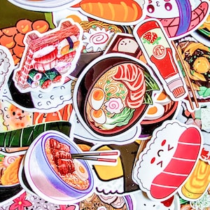 May include: A collection of colorful stickers featuring various Japanese food illustrations. The stickers include sushi, ramen, and a bottle of strawberry sauce. The stickers are in a variety of shapes and sizes, with a white border.