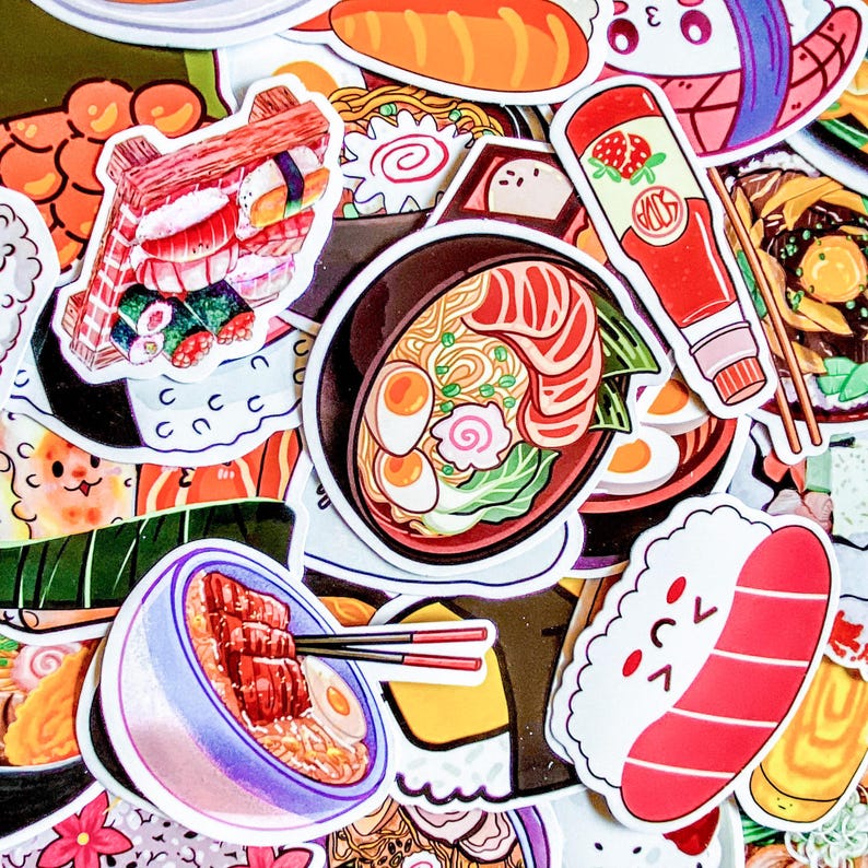 May include: A collection of colorful stickers featuring various Japanese food illustrations. The stickers include sushi, ramen, and a bottle of strawberry sauce. The stickers are in a variety of shapes and sizes, with a white border.