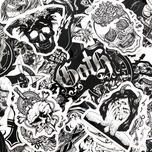 May include: A collection of black and white stickers featuring gothic and macabre designs. The stickers include skulls, demons, and the word "Goth" in a stylized font. The overall theme is dark and edgy.