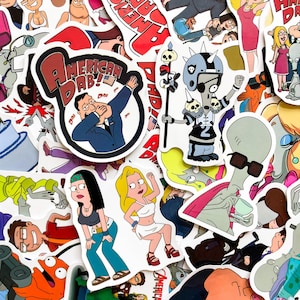 May include: A collection of colorful stickers featuring characters and phrases from the animated television show, American Dad. The stickers include images of characters, the American flag, and the phrase "American Dab!"