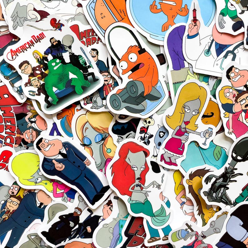 May include: A collection of colorful stickers featuring characters and logos from the animated television show, American Dad. The stickers include various characters in different poses and settings, with the show's title prominently displayed on some.