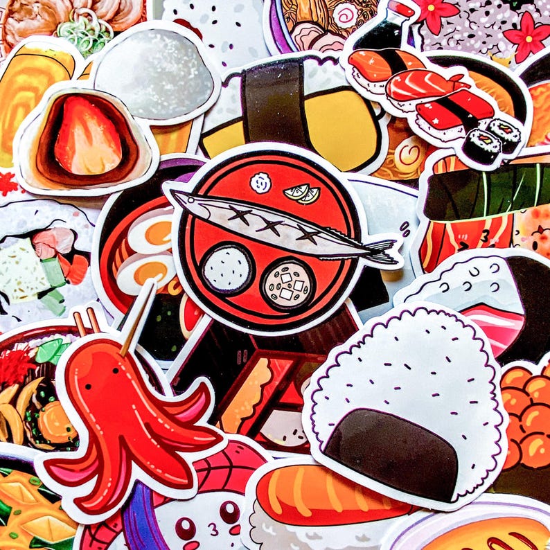 May include: A collection of colorful stickers featuring various Japanese food illustrations. The stickers include sushi, ramen, onigiri, and a red octopus. The designs are detailed and vibrant, with a focus on traditional Japanese cuisine.