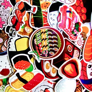 May include: A collection of colorful sushi-themed stickers. The stickers feature various sushi rolls, nigiri, and other Japanese food illustrations. The designs include salmon, shrimp, and egg sushi, along with bowls of miso soup and other Japanese cuisine.