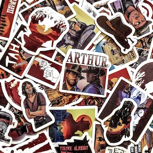 May include: A collection of colorful stickers featuring characters and scenes from a Western-themed video game. The stickers showcase various characters, landscapes, and text elements, with a mix of red, brown, and white hues.
