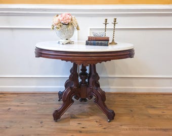 Antique 19th Century Victorian Carved Walnut Large Oval Marble Top Table.