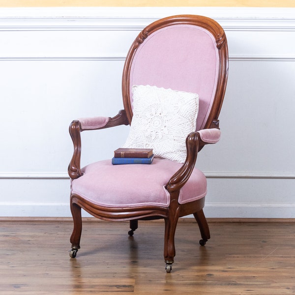 Antique Victorian Carved Mahogany with Pink Velvet Arm Chair.