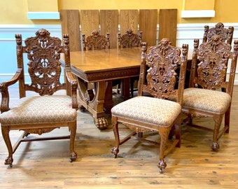 Antique Heavily Carved Oak Dining Set, Extending Dining Table and 6 Chairs.