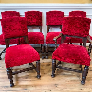 Set of 6 Antique Carved Oak Dining Chairs with Red Crushed Velvet Upholstery.