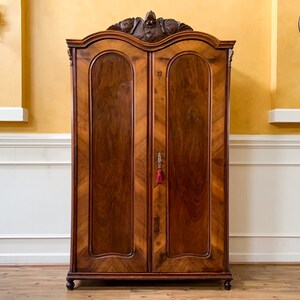 19th Century Biedermeier Double Bonnet Top Wardrobe.