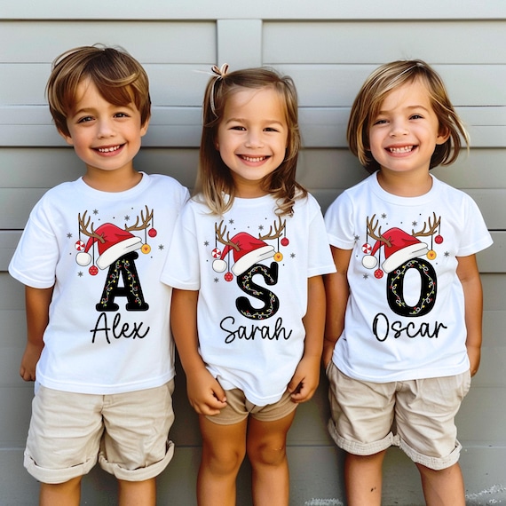 Personalized Christmas Kids Shirt, Kids Name Shirt For Christmas, Holiday Santa Hat T-Shirt, Family Matching Xmas Outfit, Gift for Kids