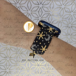 May include: Black and gold beaded bracelet with a starburst design. The bracelet is worn on a wrist. The bracelet has a dark blue clasp. The text "PDF PATTERN #58" is visible at the bottom of the image.