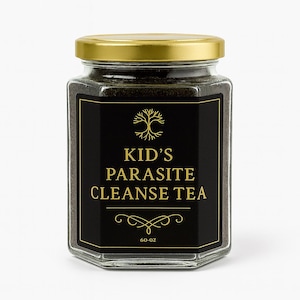 May include: A hexagonal glass jar with a gold lid, filled with dark tea. The jar has a black label with gold text that reads "Kid's Parasite Cleanse Tea" and a tree graphic. The jar contains 1700 grams of tea.