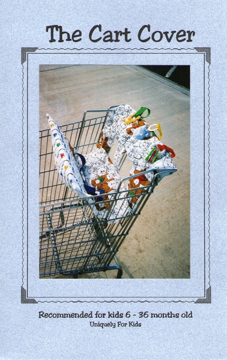 May include: A white and blue shopping cart cover with a teddy bear print. The cover is in a shopping cart and is recommended for children 6-36 months old. The text "Uniquely For Kids" is printed on the cover.
