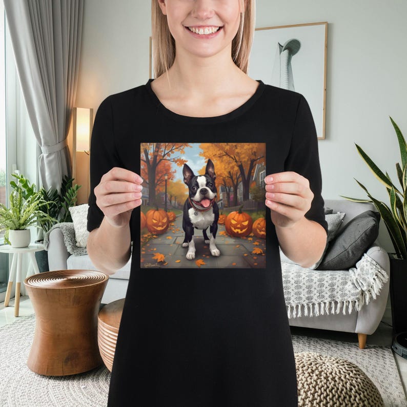 May include: A square print featuring a Boston Terrier dog standing on a sidewalk with carved pumpkins and autumn leaves. The background shows a street lined with trees in fall colors. The dog is black and white.
