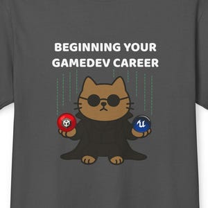 Könnte beinhalten: Dunkelgraues T-Shirt mit dem Text "BEGINNING YOUR GAMEDEV CAREER". Das Shirt zeigt eine Cartoon-Katze mit Sonnenbrille und Umhang, die zwei farbige Kugeln hält. Eine Kugel ist rot mit einem Totenkopf, die andere blau mit einem "U"-Symbol.