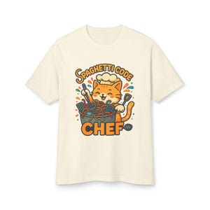 A t-shirt design featuring a cartoon cat wearing a chef's hat and holding a bowl of noodles, with the text "Spaghetti Code Chef" written above the cat.
