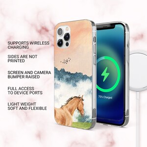 May include: A phone case with a watercolour design featuring a brown horse, blue mountains, and a peach-coloured sky. The case is shown next to a phone with a charging symbol. Text on the case reads: Supports Wireless Charging, Sides Are Not Printed, Screen and Camera Bumper Raised, Full Access to Device Ports, Light Weight Soft and Flexible.