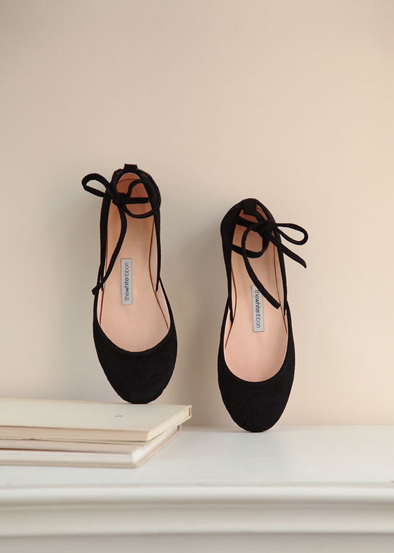 black flats with turquoise bottom
