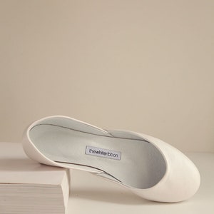 pearly ivory smooth leather ballerina shoe shown from the top