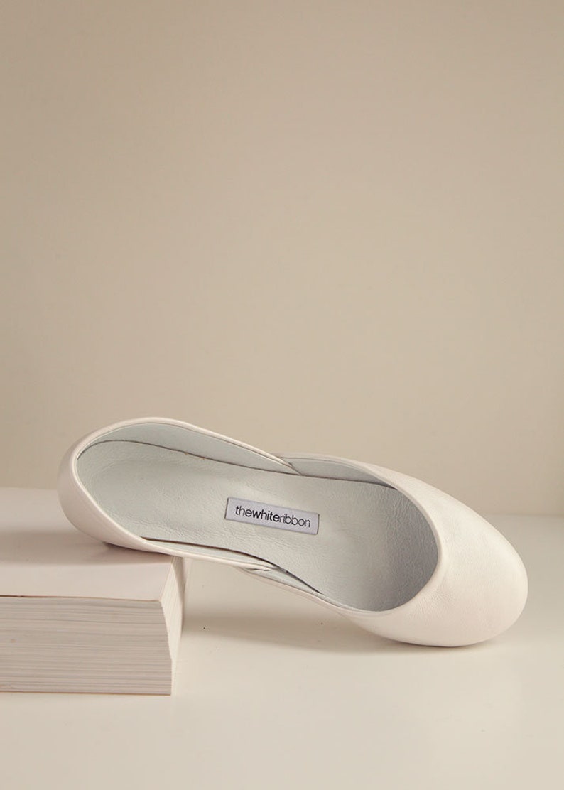 pearly ivory smooth leather ballerina shoe shown from the top