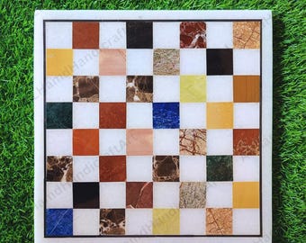 Luxe met marmer ingelegd schaaktafelblad – handgemaakt natuursteenkunstwerk