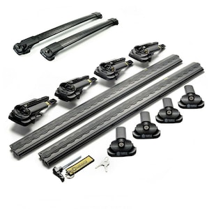 May include: A collection of black car roof rack components, including crossbars, mounting feet, and hardware. The crossbars have a textured design. The image also shows keys and a keychain with the text "OCEAN AUTO".