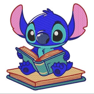 May include: An embroidered image of a blue cartoon character with large ears and big eyes, reading a book. The character is sitting on a stack of books, with the pages of the book open. The image is detailed with various shades of blue, pink, and tan.