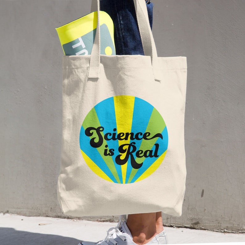 Made in the USA blue Science is Real Cotton Tote Bag