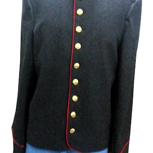 May include: A dark gray military-style jacket with a mandarin collar and gold buttons. The jacket has red trim along the collar, cuffs, and button line. The jacket is paired with light blue pants.