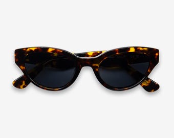 BCBGeneration  Tortoiseshell Cat-Eye Sunglasses - Dark  Lenses black BCBGeneration 54mm Cat Eye Sunglasses | Nordstromrack main image 3