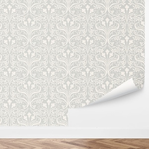 May include: A white and gray wallpaper with a repeating floral pattern. The pattern features stylized flowers and leaves in a traditional design.