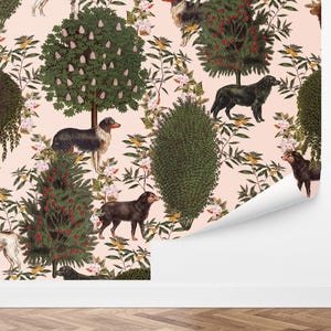 May include: A pink background with a repeating pattern of trees, flowers, and dogs. The trees are green with pink flowers and red berries. The dogs are black, brown, and white.