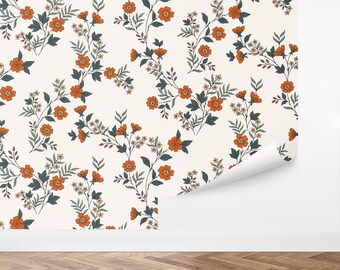 May include: A seamless pattern featuring a repeating design of orange flowers and green leaves on a white background.