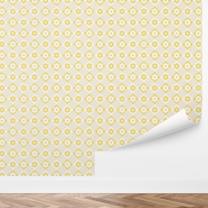May include: A yellow and white floral wallpaper pattern with a repeating design of small white flowers in yellow diamond shapes.