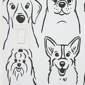 Pode incluir: Ilustra&ccedil;&otilde;es em preto e branco de v&aacute;rias ra&ccedil;as de c&atilde;es em um fundo branco. Um interruptor de luz &eacute; vis&iacute;vel no centro da imagem.