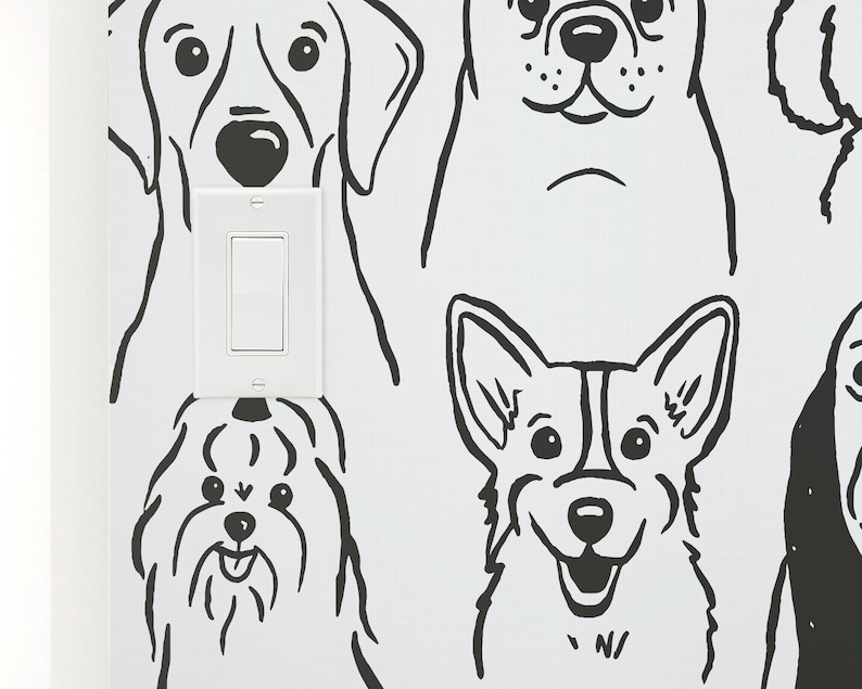Pode incluir: Ilustra&ccedil;&otilde;es em preto e branco de v&aacute;rias ra&ccedil;as de c&atilde;es em um fundo branco. Um interruptor de luz &eacute; vis&iacute;vel no centro da imagem.