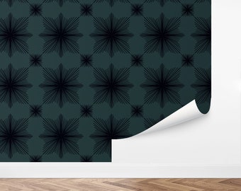 May include: Teal wallpaper with a repeating pattern of black starbursts. The wallpaper has a peel-and-stick backing.