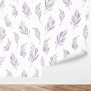 May include: A seamless pattern featuring a repeating design of purple watercolor leaves on a white background.