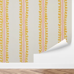 May include: A wallpaper pattern with vertical stripes of yellow and red. The yellow stripes are made up of a repeating pattern of small loops. The red stripes are solid.
