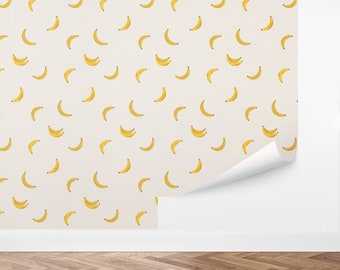 May include: A seamless pattern wallpaper featuring a repeating design of yellow bananas on a light beige background.