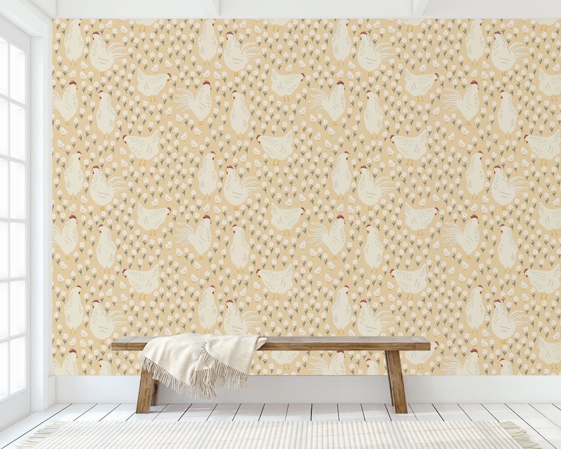 May include: A beige wallpaper with a repeating pattern of white chickens and small white flowers. A wooden bench with a white blanket is in the foreground.
