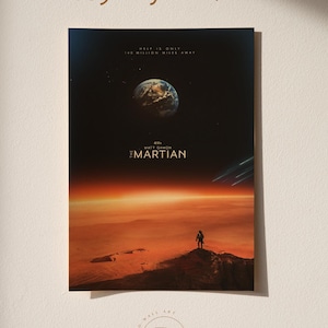 May include: A poster for the movie "The Martian" featuring a lone figure on a red planet, with Earth in the background. The poster has the text "Buy 3 get 1 free" at the top.