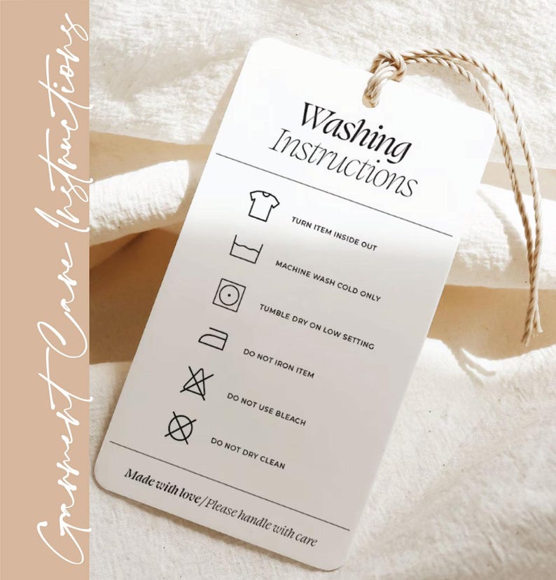 a white laundry instructions tag with black text and icons, providing guidelines for washing clothes.
