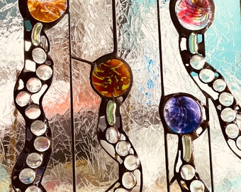 Stained glass dancing flowers with blown glass discs and glass gems